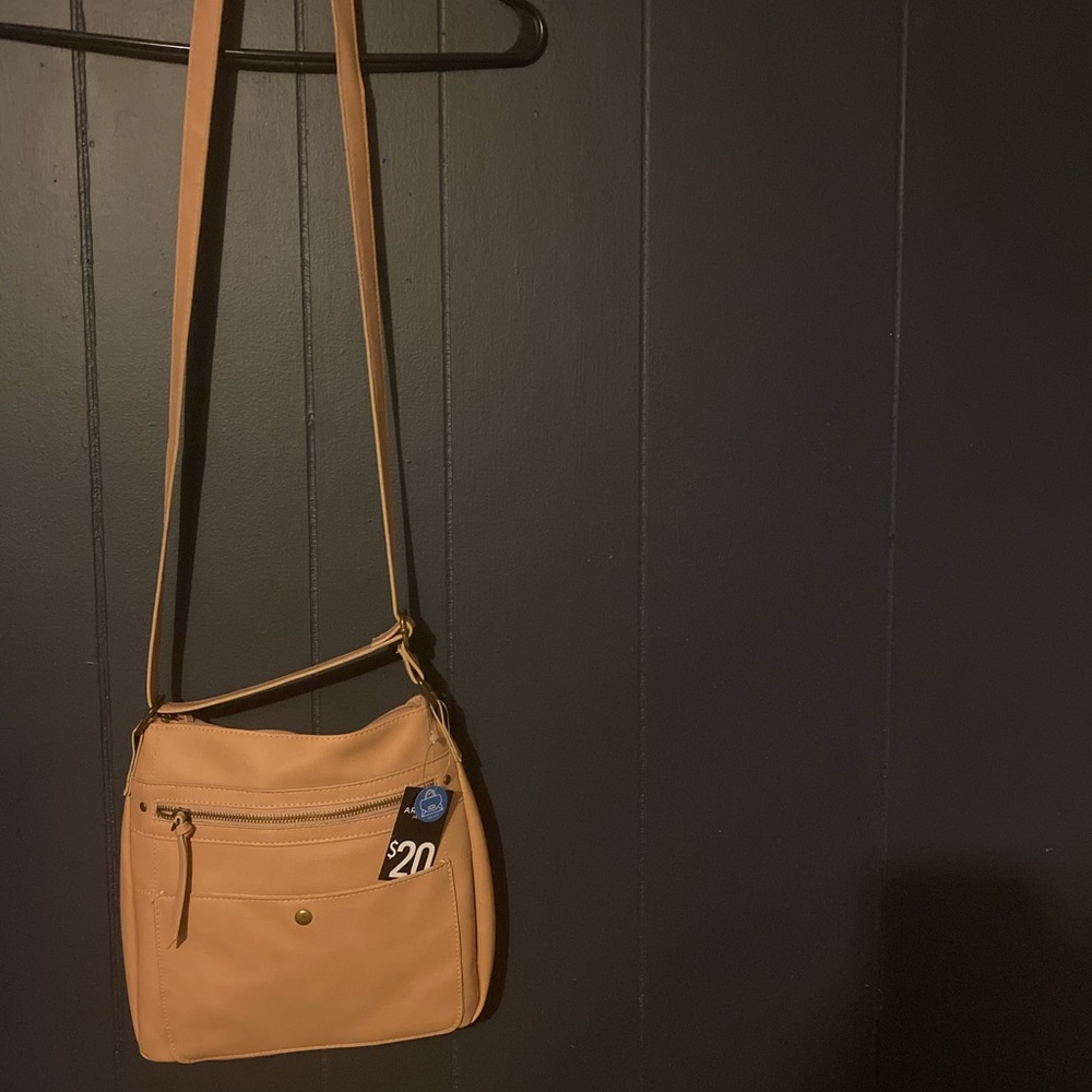 Brand new crossbody purse.